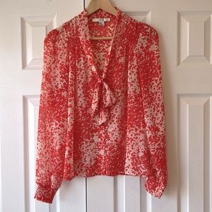 Sheer pink and white blouse with bow